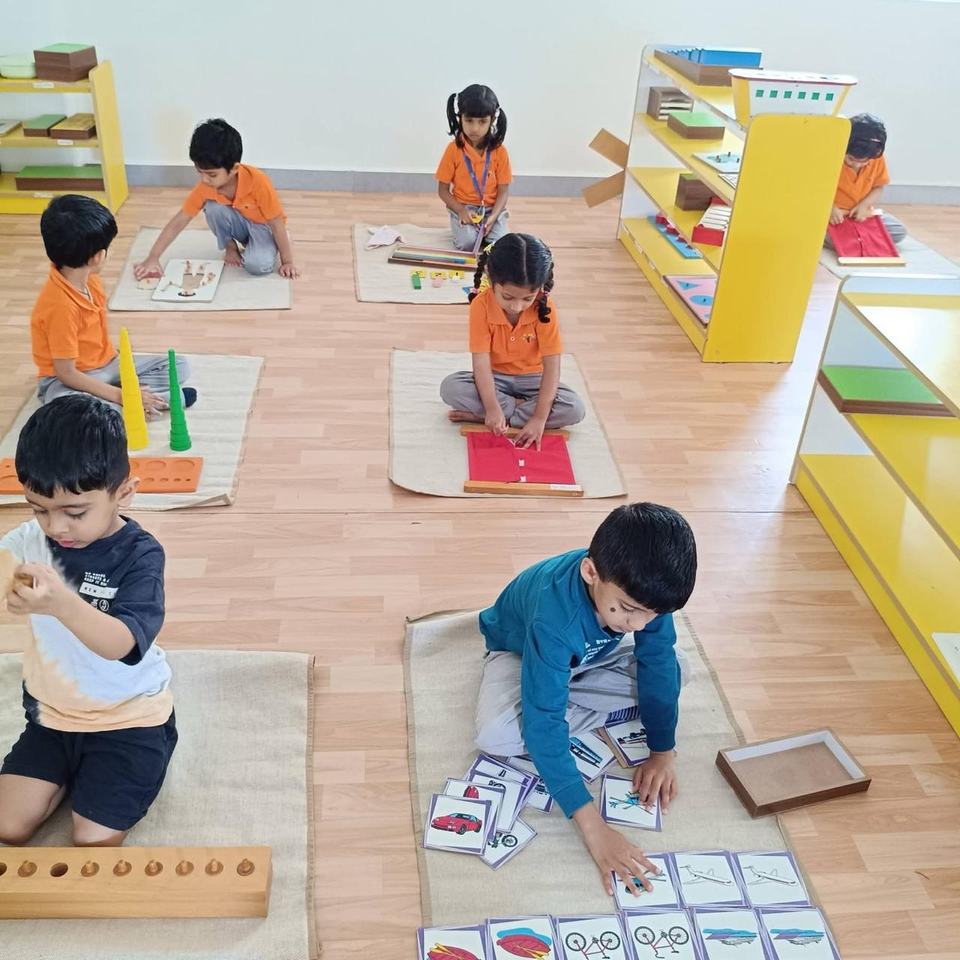 Children doing individual Montessori work